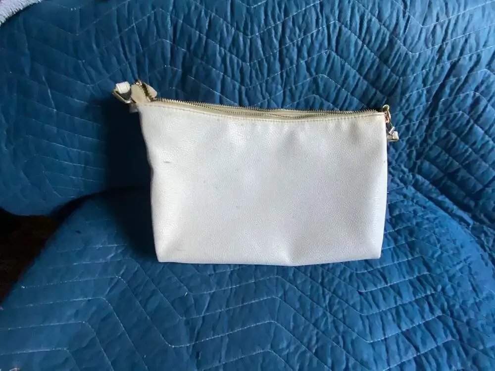 Bebe Los Angeles Ivory Pebbled Faux Leather Wristlet Clutch